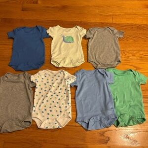 7 Gently used Primary Baby Organic Cotton (GOTS certified) onesies (3-6 months)